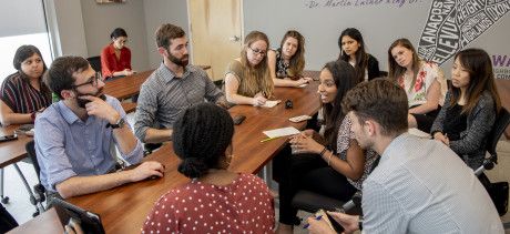 SMHS students sitting around a table