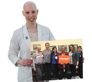 Student holding photo of her and other students on Capitol Hill