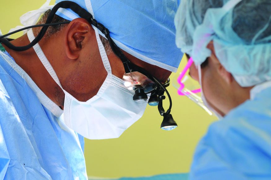 J. Keith Melancon, MD,  performing kidney transplant surgery.