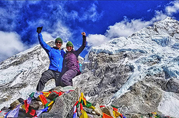 Memo Sanchez and his wife on top of Mount Everest