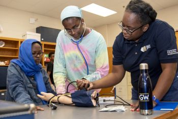TC Williams HS students learning to take blood pressure